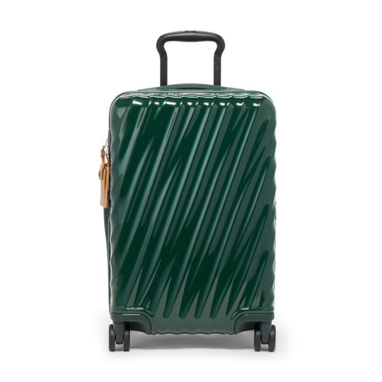 Green suitcase with a striped pattern on a white background