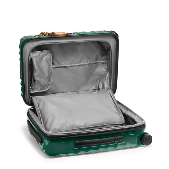 Green suitcase with open lid on a white background