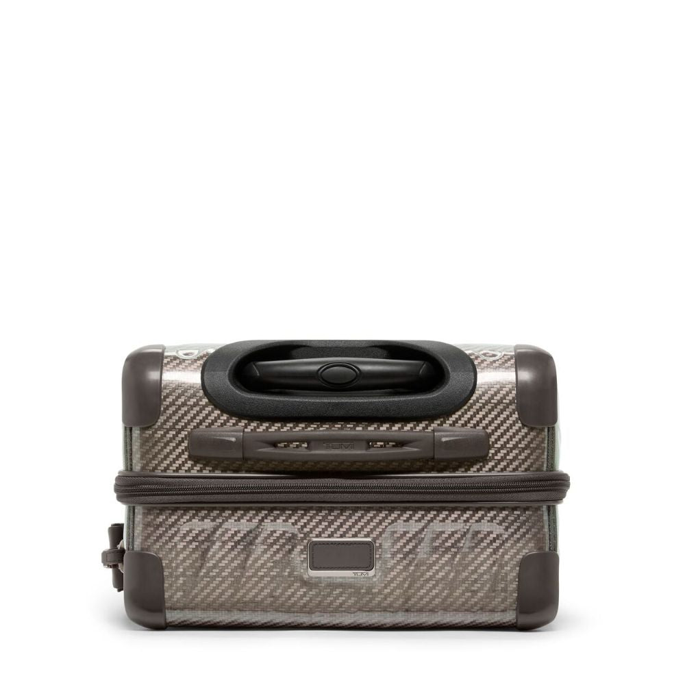 Small suitcase with a carbon fiber pattern on a white background
