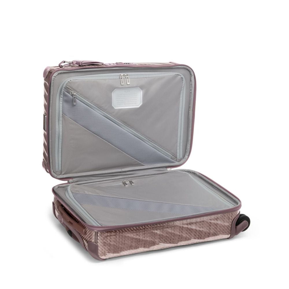 Open suitcase with clear compartment on a white background