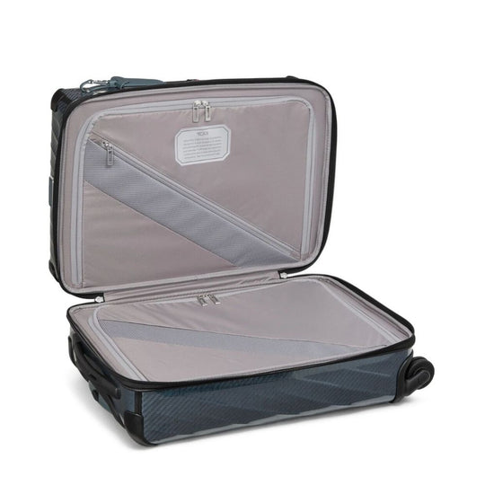 Open suitcase with transparent interior on a white background