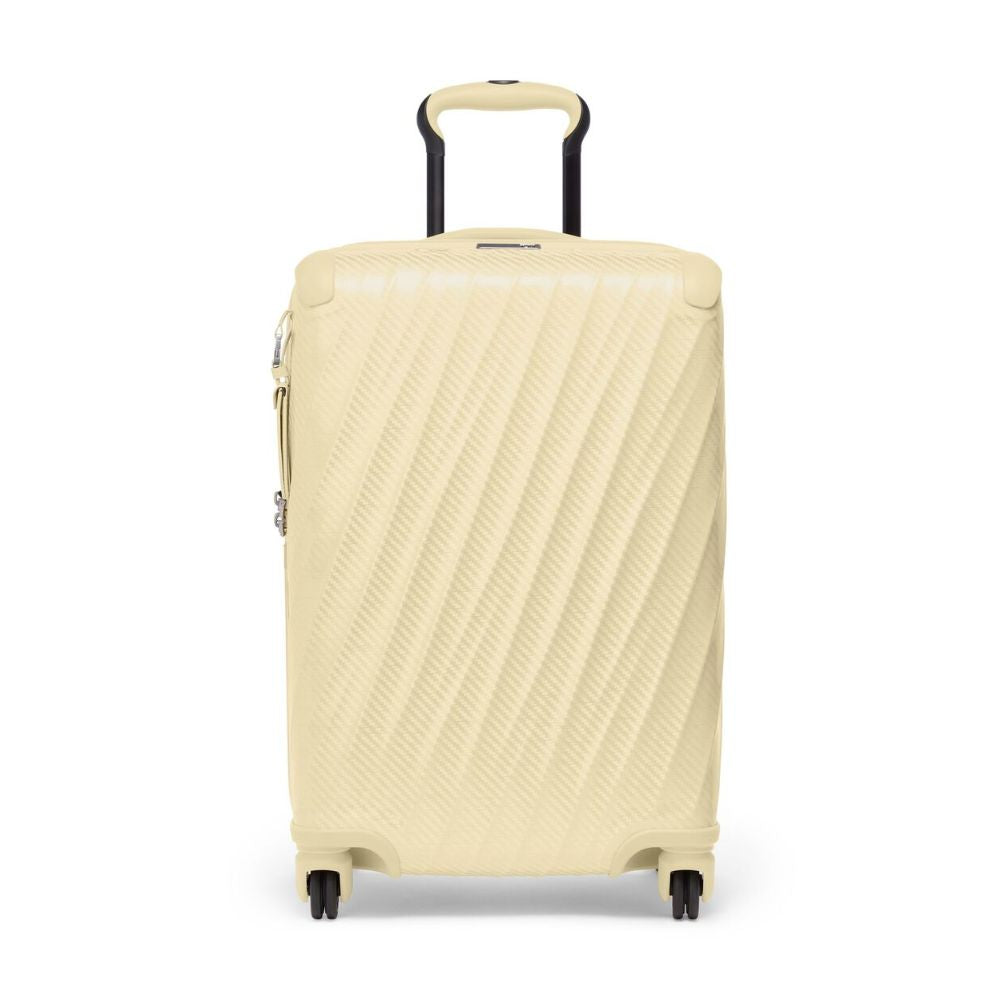 Beige suitcase with a textured pattern on a white background