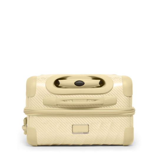 Beige makeup case with a handle on a white background