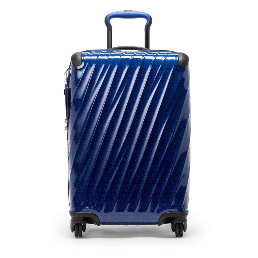Blue suitcase with a textured pattern on a white background
