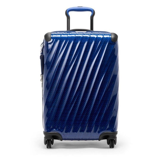 Blue suitcase with a textured pattern on a white background