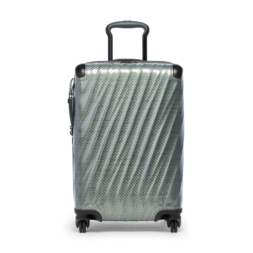 Silver suitcase with a geometric pattern on a white background