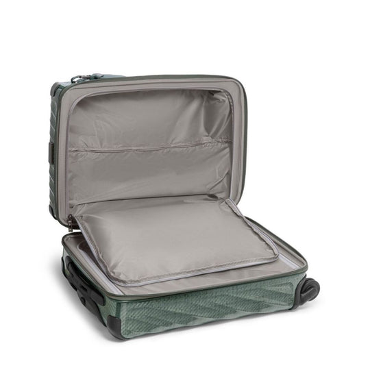 Open green suitcase on a white background