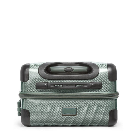Green suitcase with black handle and wheels on a white background
