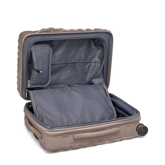 Open beige suitcase with a white background