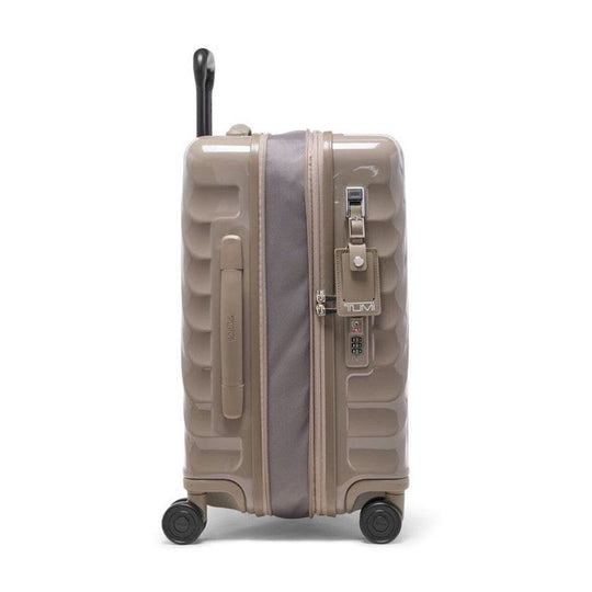 Beige suitcase with a gray strap on a white background