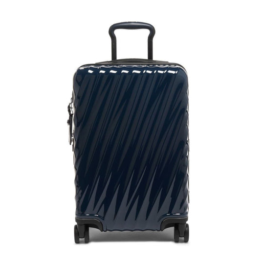 Navy blue suitcase with diagonal stripes on a white background