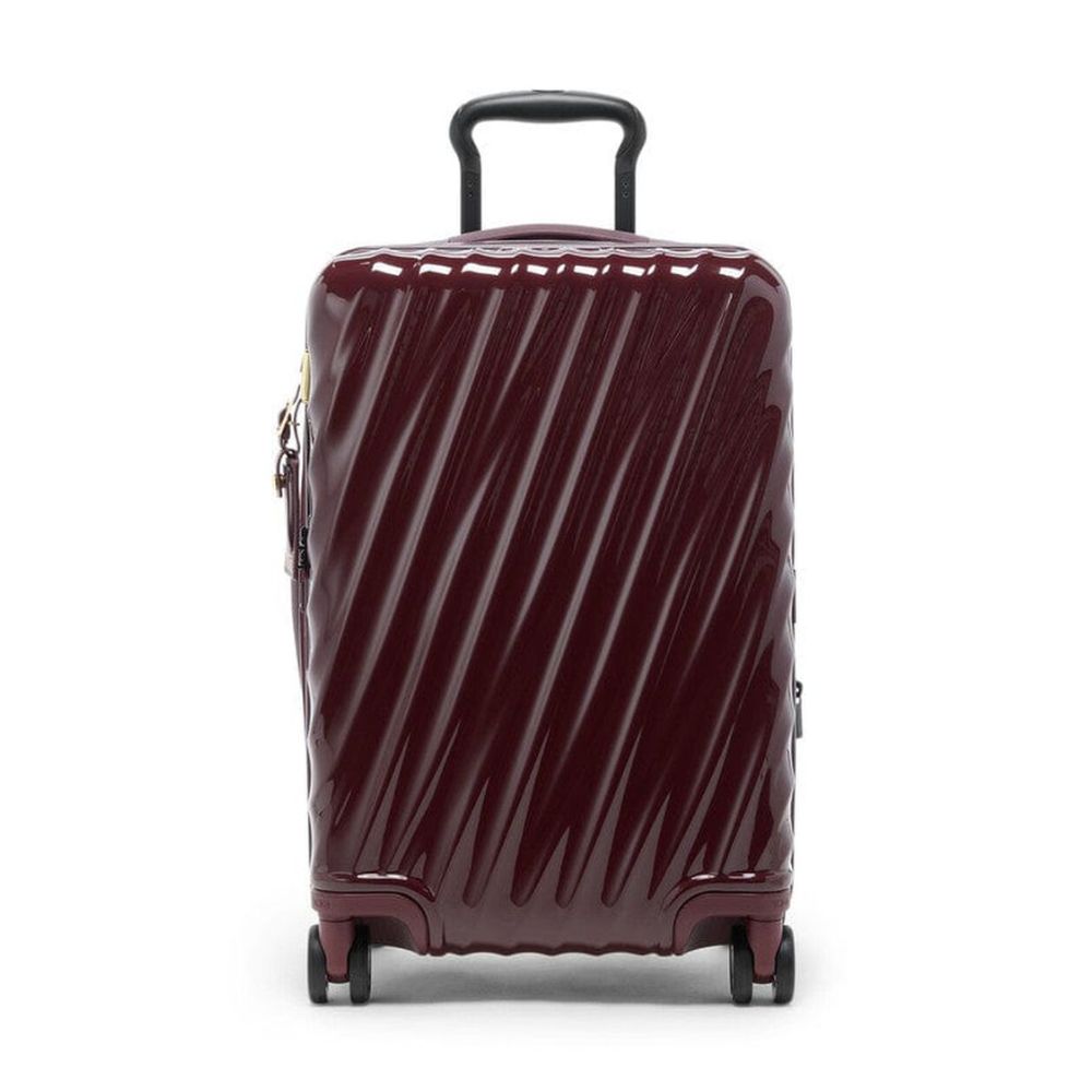 Maroon suitcase with diagonal stripes on a white background