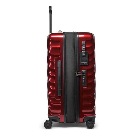 Red suitcase with black accents on a white background