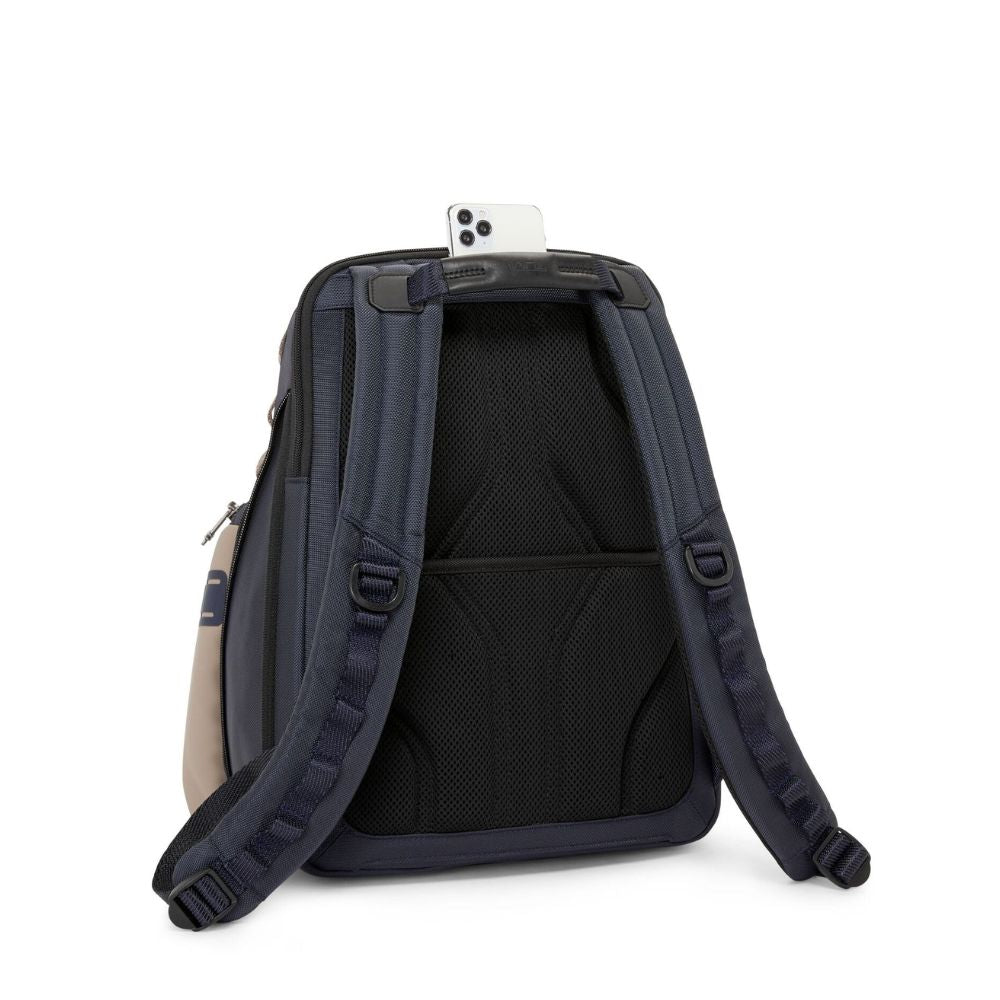 Backpack with visible straps and interior on a white background