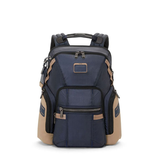 Navy and beige backpack with multiple pockets on a white background