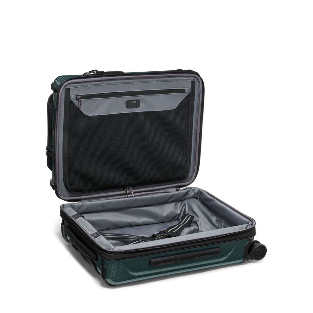 Open green suitcase with gray interior on a white background
