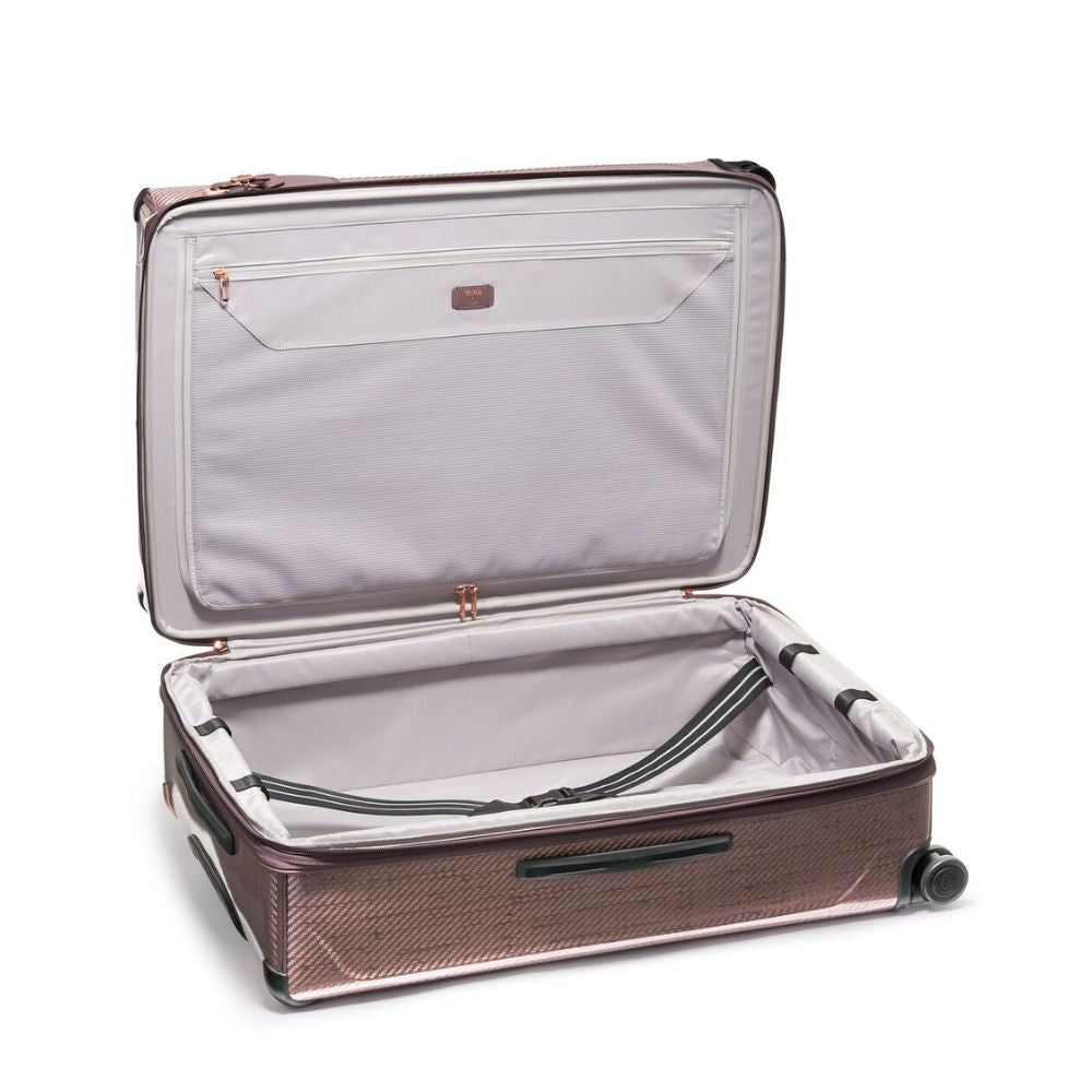 Open suitcase with interior visible on a white background