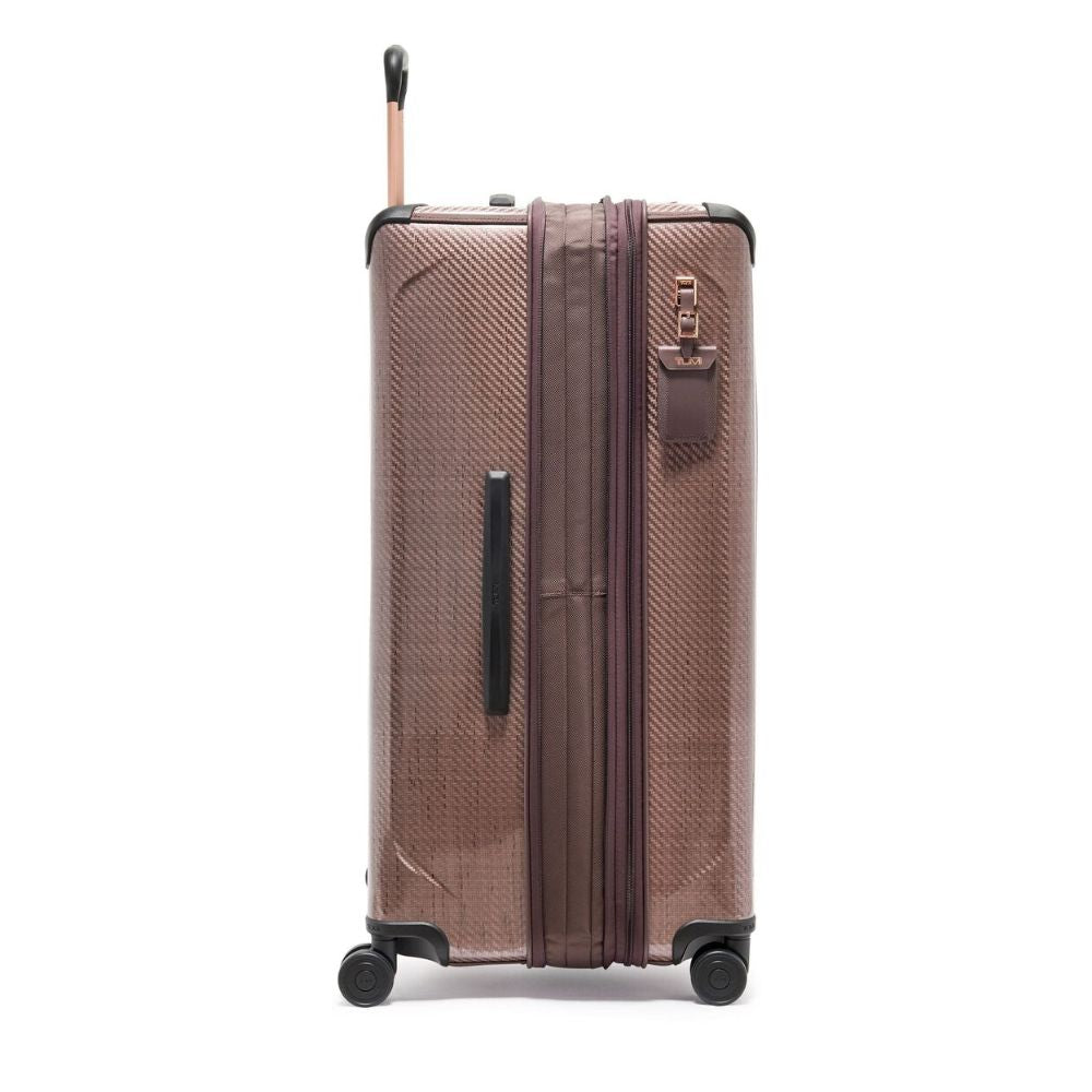 Brown suitcase with wheels and handle on a white background