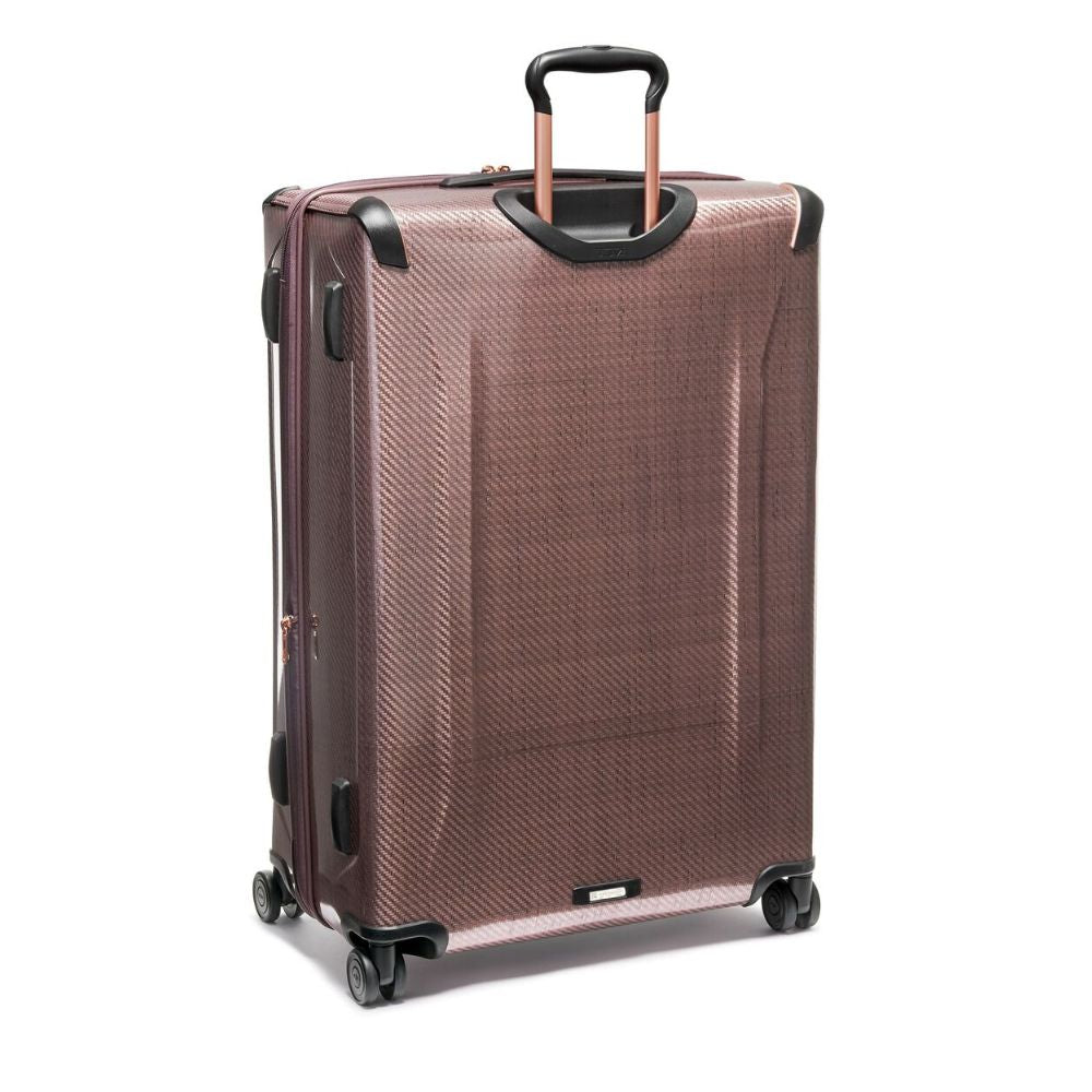 Brown suitcase with wheels and handle on a white background
