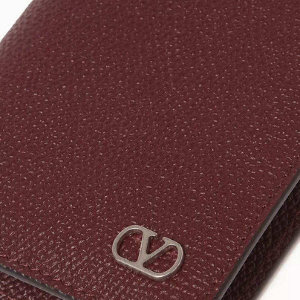 Close up of V Logo on Valentino Garavani VLOGO Signature Card Holder in Grained Calfskin